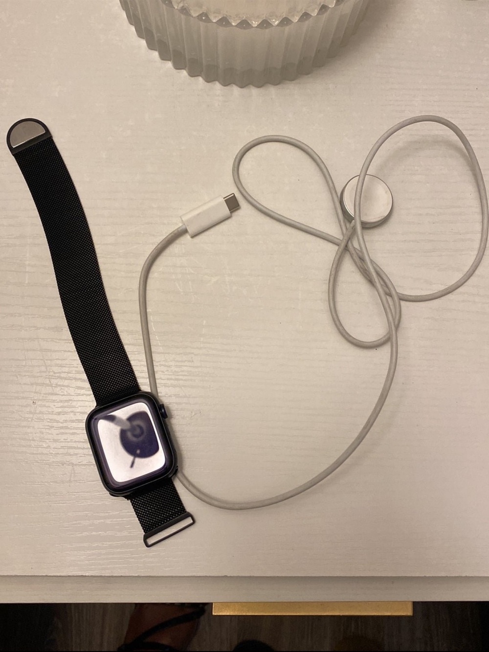 Apple Black Smartwatch with White Magnetic Charger